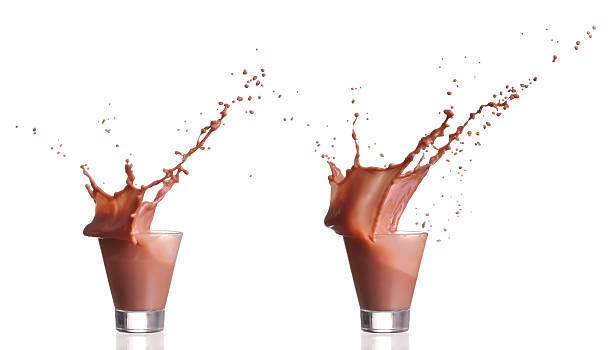 istock Milk and chocolate cacao splash in a glass 470985792