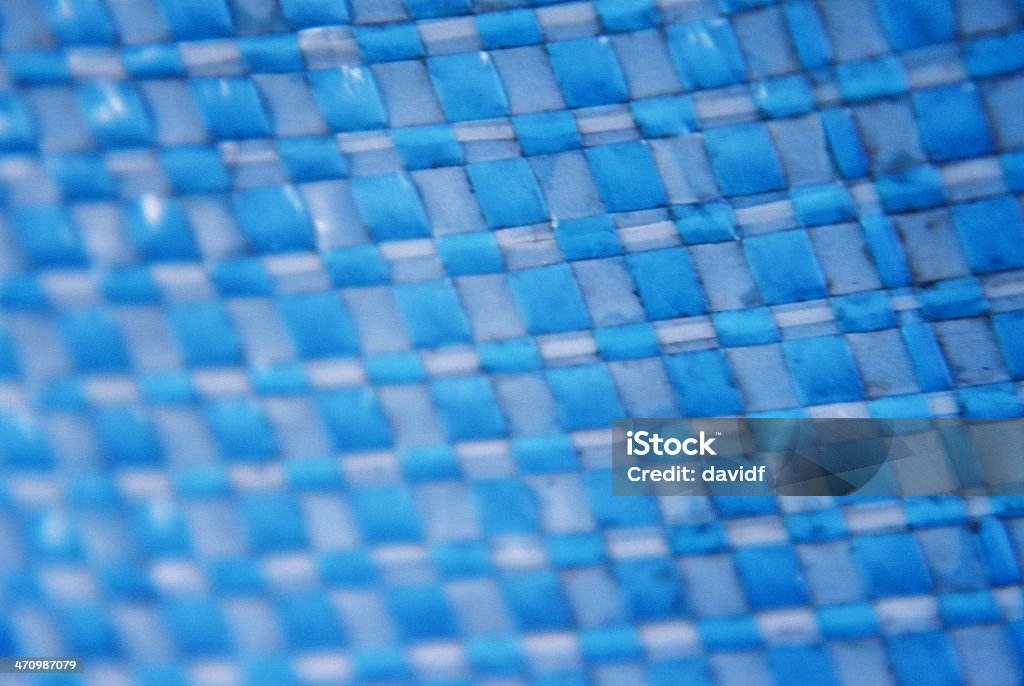 Plastica blu in mesh - Foto stock royalty-free di Motivo a griglia