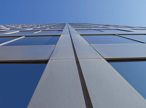 Exterior perspective of office building and sky in downtown St. Louis. 