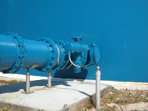 Blue water tank pipes stock photo