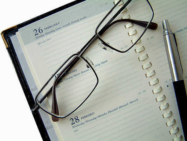 tagesordnung - personal organizer address book diary glasses stock-fotos und bilder