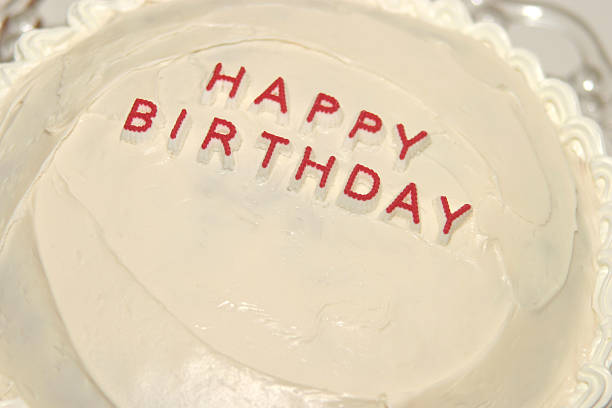 block letter birthday cake stock photo