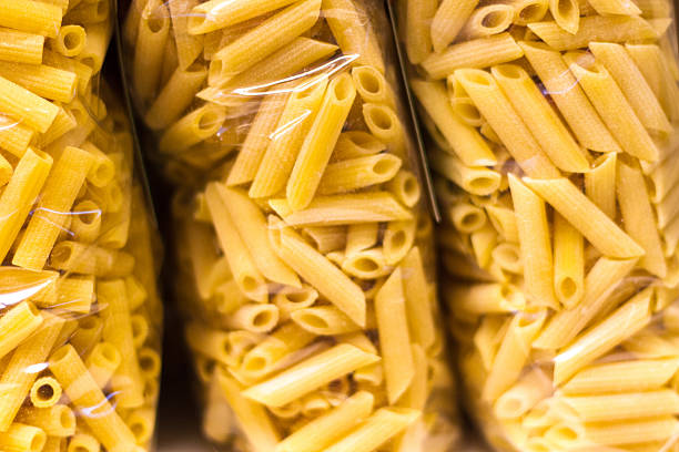 Three Packages of Penne Pasta (Close-Up) stock photo