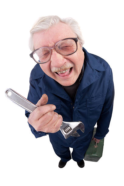 istock Fisheye Laughing Mechanic Holding Wrench And Toolbox 470995740