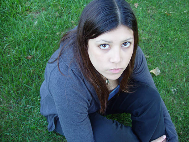 Young girl looking up stock photo