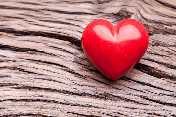 istock Red heart on a wooden table. 470998870