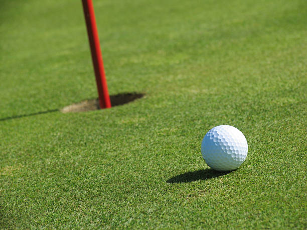istock Golf Ball Near The Hole 471001613