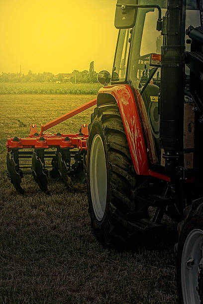 istock Agricultural equipment in sunset light. Detail 471001804