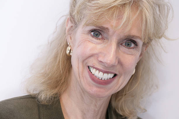 istock Woman in her Fifties Smiling 471001853