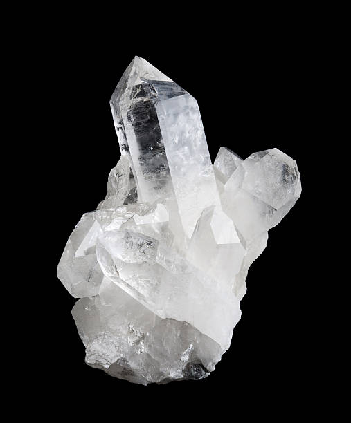 Quartz Crystal Cluster High Size on Black Background Quartz crystal cluster high size on black background, mineral also used as semi-precious gemstones. Silica, silicon dioxide, SiO2. crystal stock pictures, royalty-free photos & images