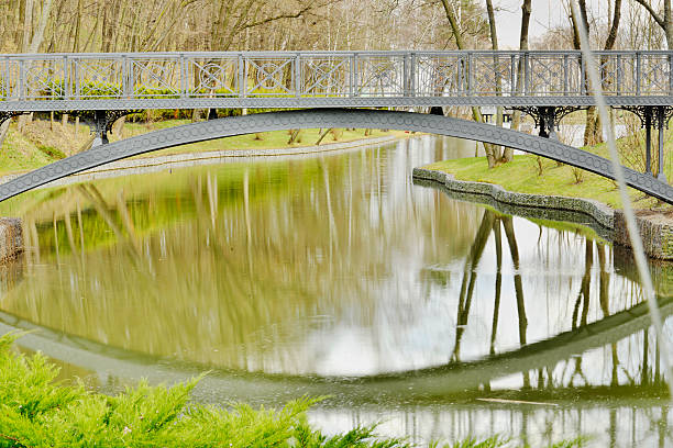istock Beautiful bridge over the lake 471005412