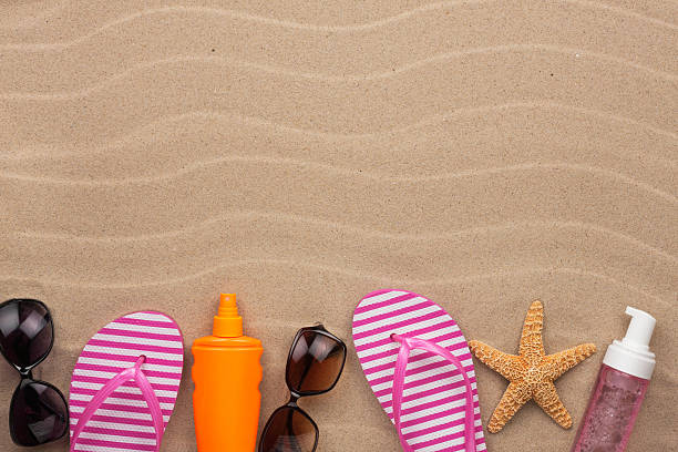 istock Accessories for the beach  lying on the sand 471005766