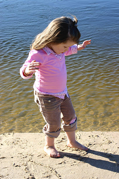 istock girl at the beach 471007469