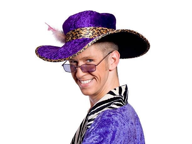 Pimp Daddy male wears purple costume pimp hat stock pictures, royalty-free photos & images