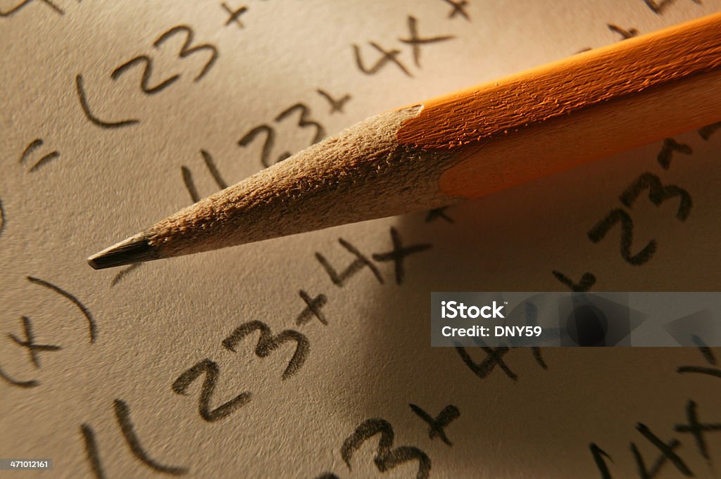 Mathematical Equation 2 Pencil  resting over mathematical equation Algebra Stock Photo