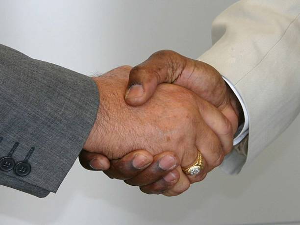 black and white shaking hands 2 stock photo