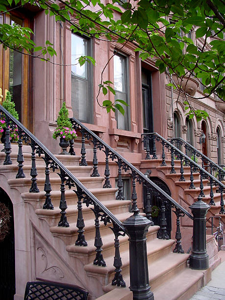 istock brownstone homes with ornate stair railing 471012619