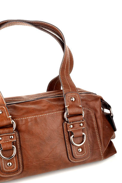 istock Brown woman bag on white background 471015014