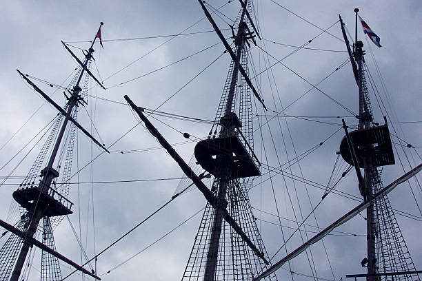 ship's mast This was taken while touring in the canals of Amsterdam. gaff rigged stock pictures, royalty-free photos & images