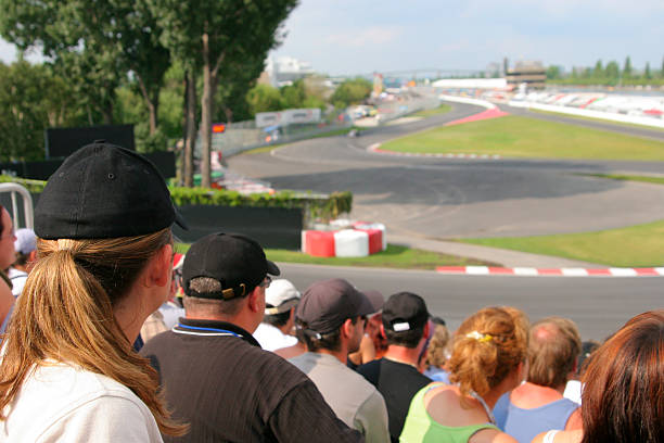 Focused Spectators at a car race  same person multiple images stock pictures, royalty-free photos & images