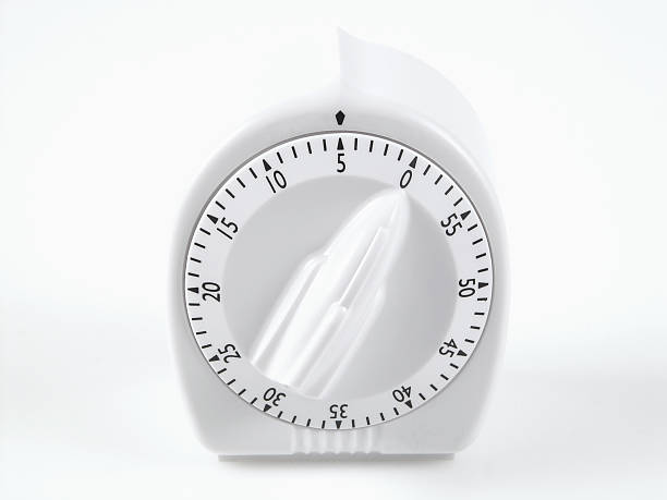 white timer set at five minutes A white timer on a white background set at five minutes, great way to say "fast service" or "service under five minutes" five minutes timer stock pictures, royalty-free photos & images