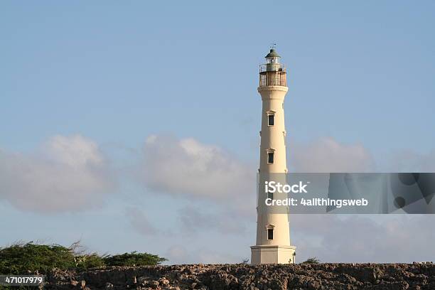 Lighthouse On The Rocks In Aruba Stock Photo - Download Image Now - Aruba, Beacon, Built Structure