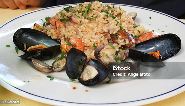 Risotto De Pescados Y Mariscos De Alla Pescatora Foto de stock y más banco de imágenes de Risotto - Risotto, Almeja - Animal, Arroz - Comida básica