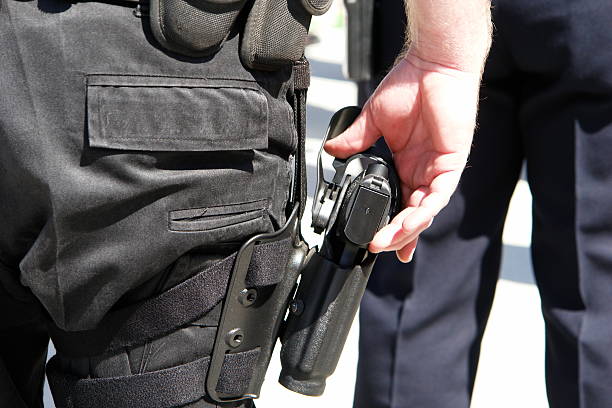 istock SWAT Police Officer 9mm Gun 471033791