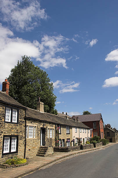 istock Typical English village cottages 471033931
