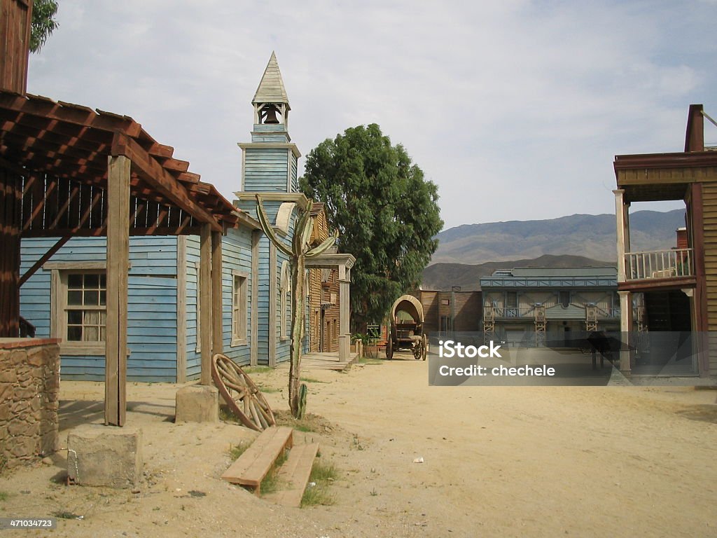 Far west "Series"- Church American way of life. Real far west. Here the churh ,other typical building and an old wagon. Wild West Stock Photo