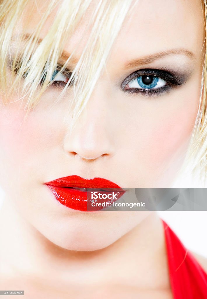 Red Lips Close-up of model's face with bright red lips. Adult Stock Photo