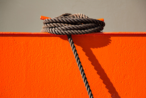 Ship rope on red side wall