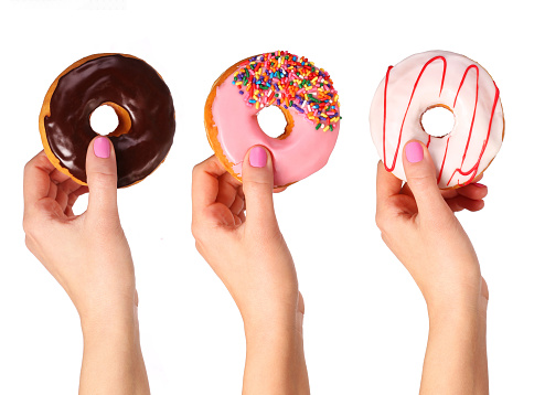 Donuts in hands collection, isolated on white background