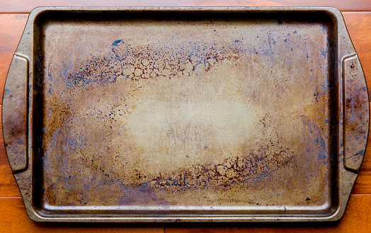 Old dirty oven baking tray