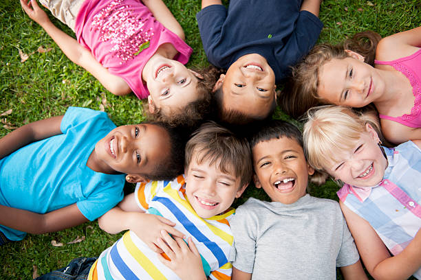 Children in a Circle Looking up