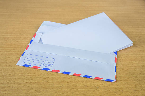 istock Air mail letter on wood background. 471047240