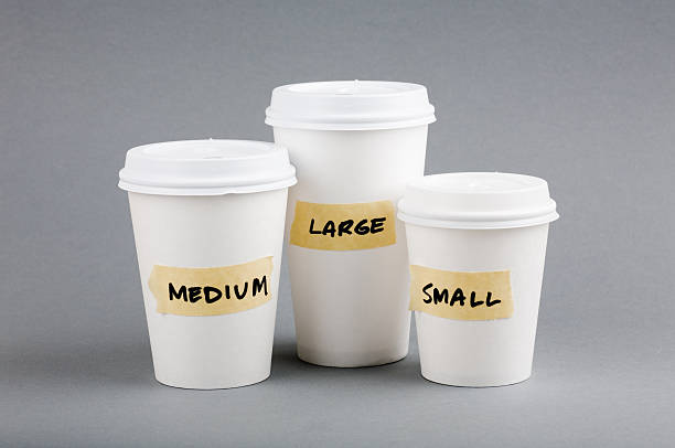 Three coffee cups sized small, medium, and large  stock photo