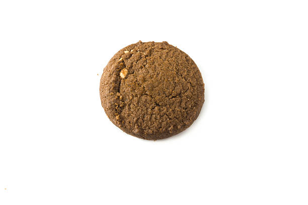 istock Chocolate cookies isolated on white background 471049086