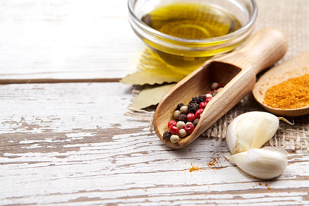 istock Spices on wooden background 471049250