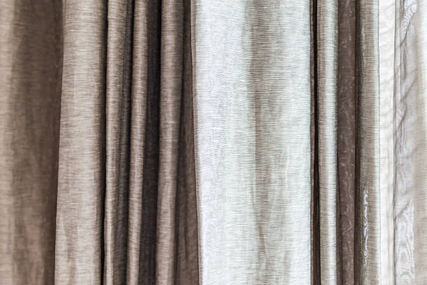 istock White and gray curtains at the windows 471049794