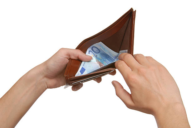 istock Man is opening his wallet with 20 Euros in it 471051015