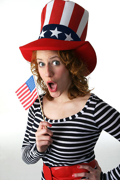 istock Patriotic Woman Waves US Flag 471051899
