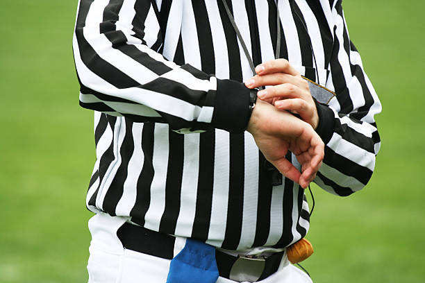 Referee time decision stock photo