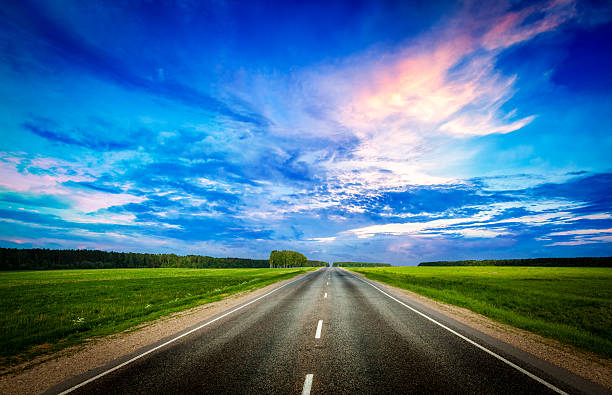 istock Road and stormy sky 471054244