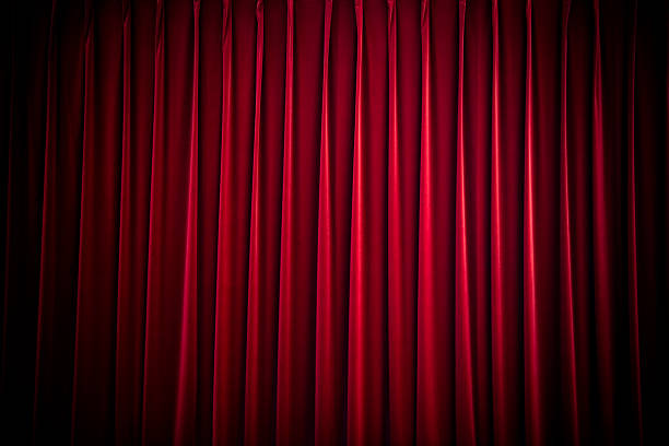 red velvet theatre curtain deep red stage curtain in spotlight, background texture with space for text stage curtain up stock pictures, royalty-free photos & images