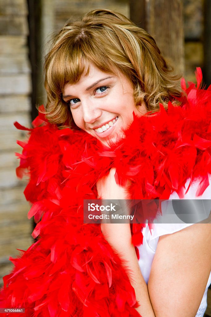 Bright Smile bright smile, beautiful young woman with a beautiful smile, red feather boa around her neck, portrait Feather Stock Photo