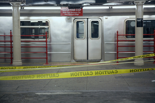 Subway platform cordoned off during a police investigation, New York City, NY, USA.