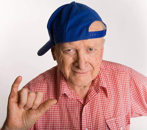 istock Hip senior citizen flashes a Shaka (
