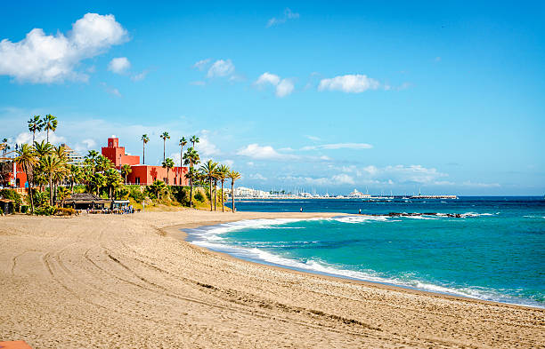 絵のように美しい海岸沿いの街で benalmadena - spain blue vibrant color bright ストックフォトと画像