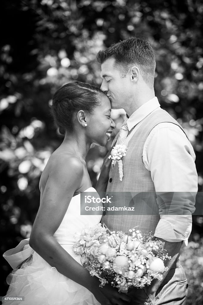 Attractive Diverse Wedding Bride and Groom An attractive and diverse couple together on their wedding day. 2015 Stock Photo